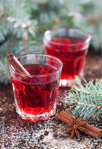 Photo: Hibiscus tea with spices, selective focus Hibiscus tea with spices, selective focus