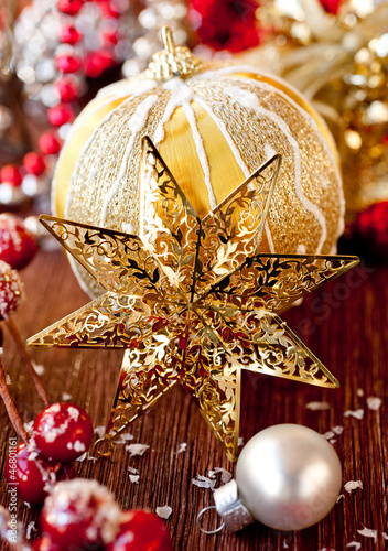 Photo: Golden Christmas star and decorations Golden Christmas star and decorations
