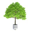 Green energy lamp with tree isolated on background