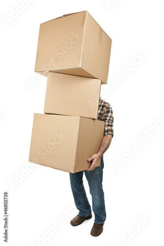 Photo: Man carrying stack of cardboard boxes Man carrying stack of cardboard boxes
