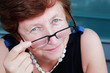 Portrait of 65-years-old beautiful woman outdoors