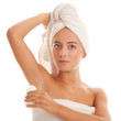 Woman using deodorant