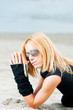 Woman relaxing on the beach