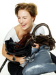 Woman has fun to adhere her bags