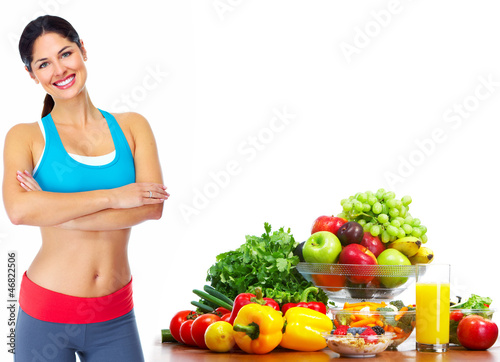 Photo: Young healthy woman with fruits. Young healthy woman with fruits.