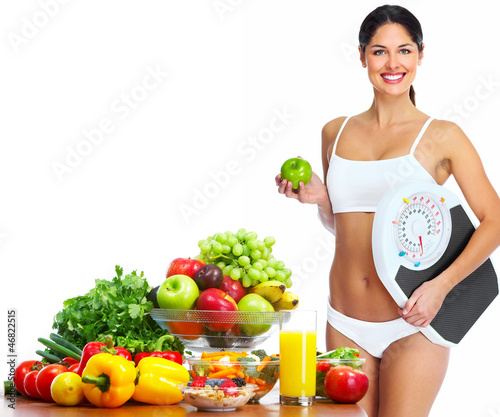 Photo: Young healthy woman with fruits. Young healthy woman with fruits.