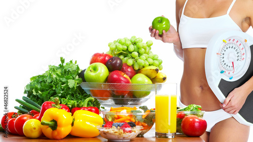 Photo: Young healthy woman with fruits. Young healthy woman with fruits.