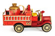 Photo: Vintage tin fire truck toy isolated on white Vintage tin fire truck toy isolated on white