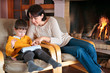Photo: Mother and son playing on digital tablet PC Mother and son playing on digital tablet PC