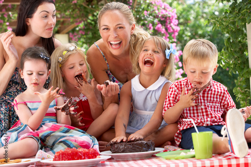 Photo: Children And Mothers Eating Jelly And Cake At Outdoor Tea Party Children And Mothers Eating Jelly And Cake At Outdoor Tea Party