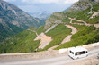Minibus, Winding Road And Albanian Mountains