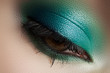 Photo: Elegance close-up of female eye with mint color eyeshadow Elegance close-up of female eye with mint color eyeshadow