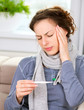 Headache. Sick Woman with Thermometer. Flu