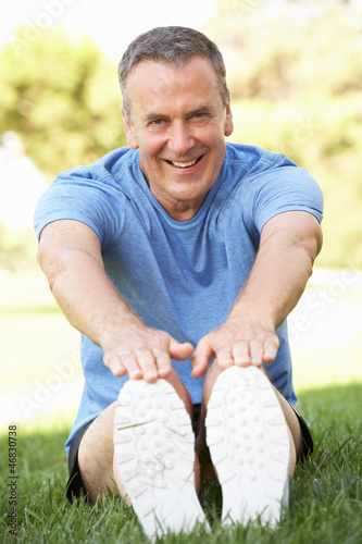 Photo: Senior Man Exercising In Park Senior Man Exercising In Park