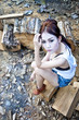 Photo: Beautiful young Asian woman wearing blue short jean Beautiful young Asian woman wearing blue short jean