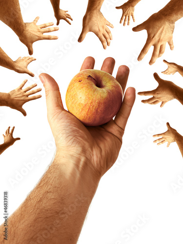 Photo: Hand Sharing Juicy Nutritious Apple to Community Hand Sharing Juicy Nutritious Apple to Community