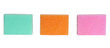 three colorful sponges on white background
