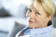 Closeup of senior woman with blue shirt