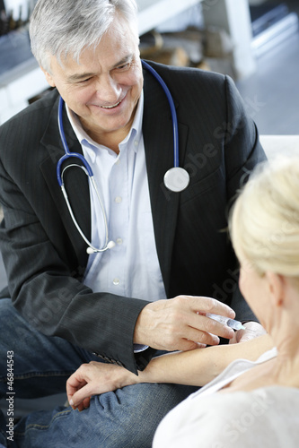 Photo: Doctor doing vaccination to patient Doctor doing vaccination to patient