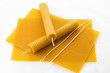 two Candle made of beeswax on honeycomb - background