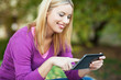 Young woman using digital tablet