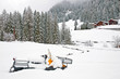 Snowmobile covered with snow