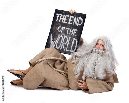 Photo: visionary with a sign of the end of the world visionary with a sign of the end of the world