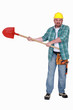 angry craftsman holding a shovel