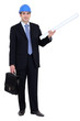 Man stood with briefcase and construction plans