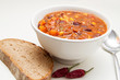 Chilli con carne in a bowl with bread