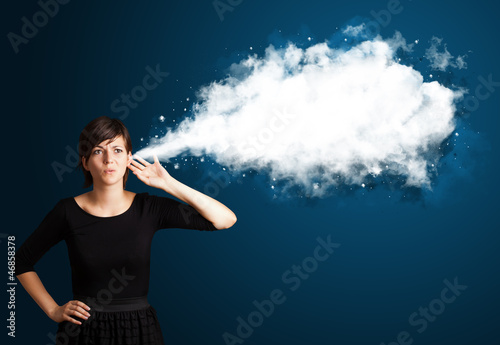 Photo: Young woman with abstract cloud Young woman with abstract cloud