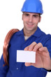 Plumber with a businesscard
