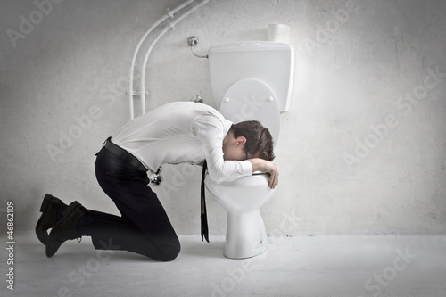 Photo: Young Businessman Vomiting Young Businessman Vomiting