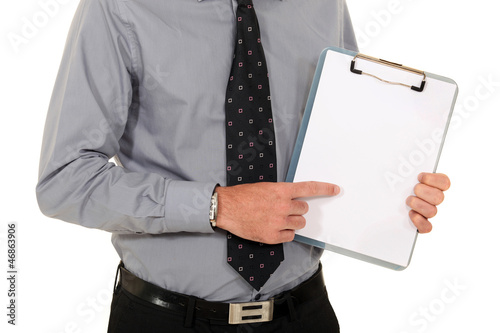 Photo: Man pointing at blank clip-board Man pointing at blank clip-board