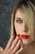 Blond woman faking surprise