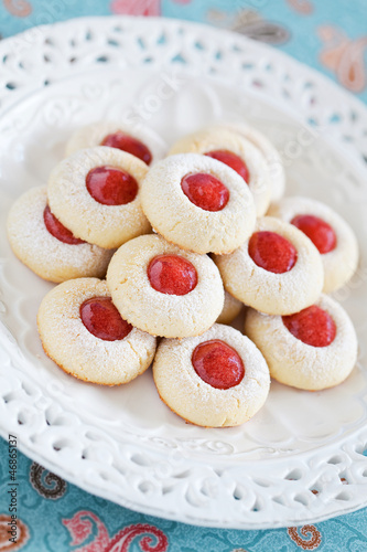 Photo: Homemade almond cookies filled with jam, selective focus Homemade almond cookies filled with jam, selective focus