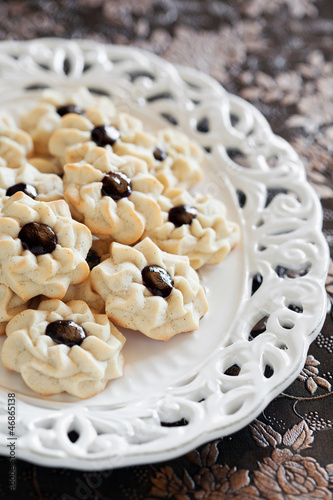 Photo: Traditional Christmas cookies with jam (Kuraby), selective focus Traditional Christmas cookies with jam (Kuraby), selective focus