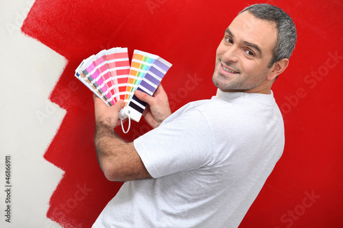 Photo: Painter with color samples Painter with color samples