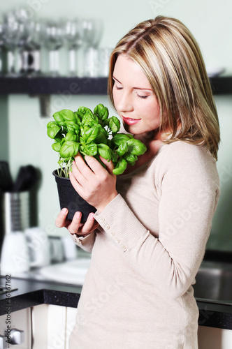 Photo: Young Woman in the Kitchen Young Woman in the Kitchen