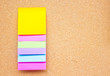 Photo: Six colorful sticky notes on wooden board. Six colorful sticky notes on wooden board.
