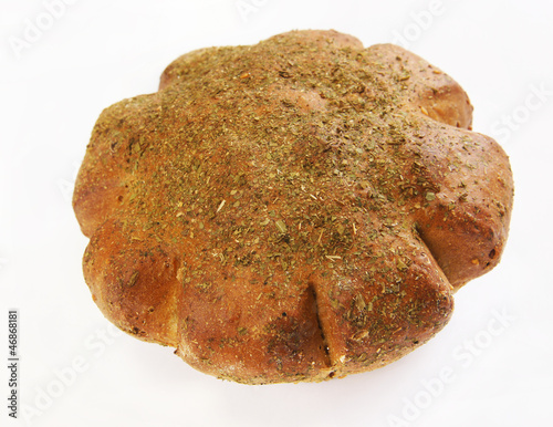 Photo: Rye loaf dusted with dry herb Rye loaf dusted with dry herb