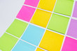 Photo: Colorful sticky notes on white background. Colorful sticky notes on white background.