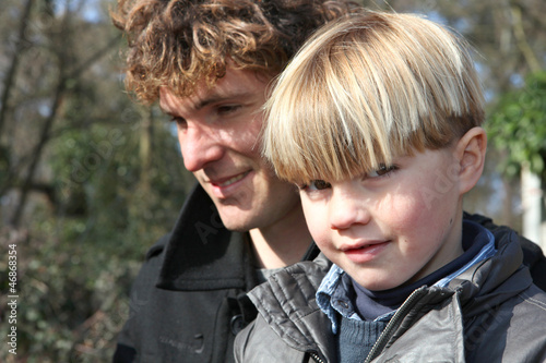 Photo: Father and son enjoying a day out together Father and son enjoying a day out together