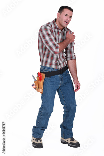 Photo: injured laborer, on white background injured laborer, on white background