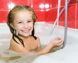 Little girl is taking a bath