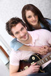 Man and woman with guitar