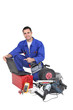 Electrician pointing to his portable computer