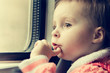 Boy rides on a train
