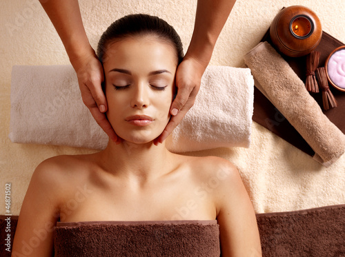 Photo: Woman having massage in the spa salon Woman having massage in the spa salon