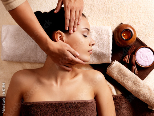 Photo: Woman having massage in the spa salon Woman having massage in the spa salon